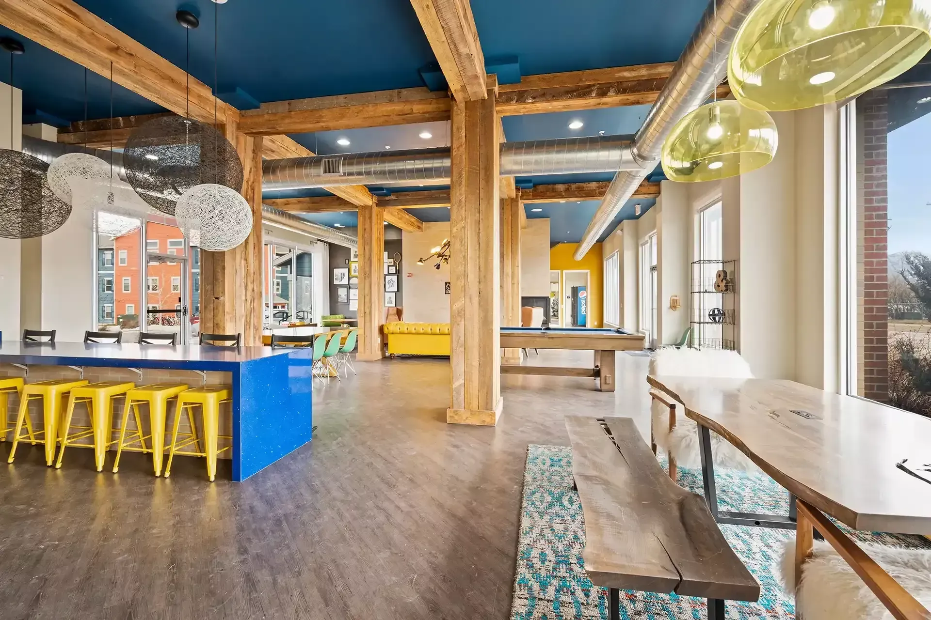Modern lounge space at Stadium View student housing just steps from MSU