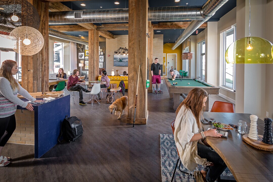 Students enjoying the lounge at Stadium View Apartments near Montana State University